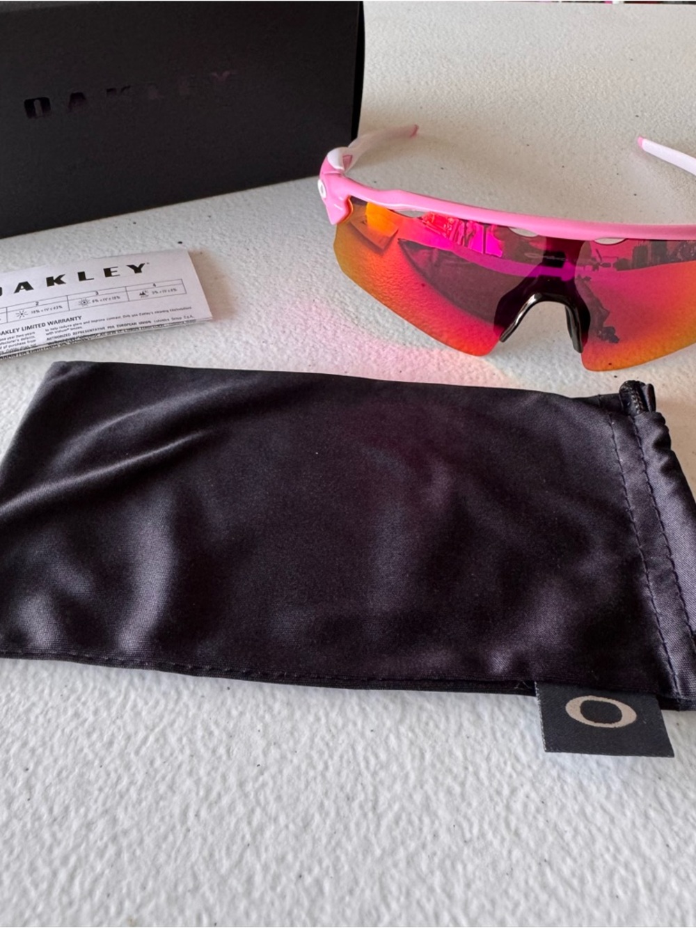 Oakley Women’s Pink Frame Sunglasses with Red-Orange Prizm Lens